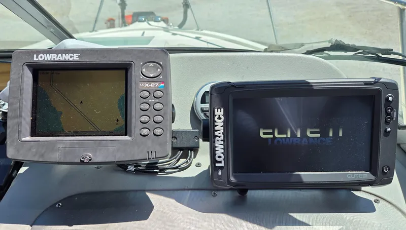 Slide: The Image of Boat dashboard with Lowrance fish finders on a 2007 Trophy 2002 Walkaround. - 8
