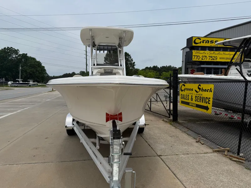 Slide: The Image of 2025 Key West 239 FS boat on trailer at sales and service location. - 2