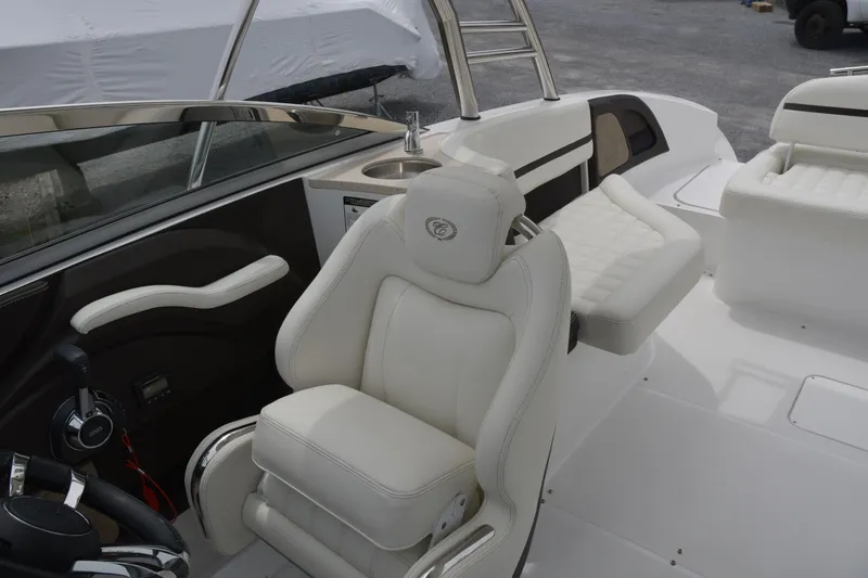 Slide: The Image of 2017 Cobalt R7 boat interior with white leather seats and steering wheel. - 10