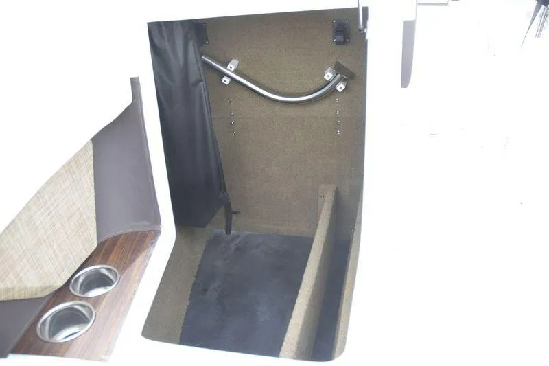 Slide: The Image of Interior cabin of 2017 Cobalt R7 boat with cup holders and storage space. - 18