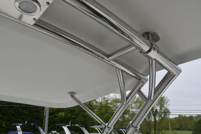 Slide: The Image of Stainless steel framework of a 2017 Cobalt R7 boat against a natural backdrop. - 19