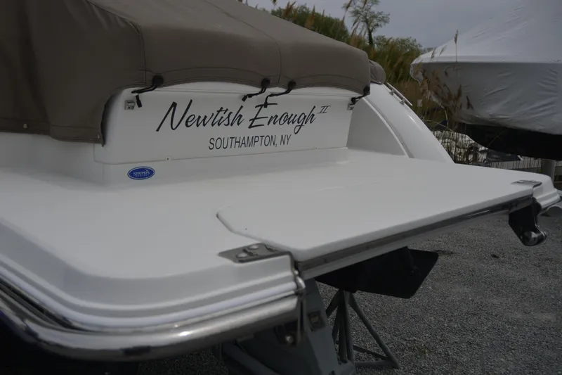 Slide: The Image of 2017 Cobalt R7 boat with "Newtish Enough" name, docked in Southampton, NY. - 4