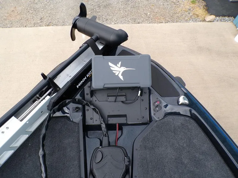 Slide: The Image of 2025 Skeeter ZXR21SE boat deck with trolling motor and control panel. - 10