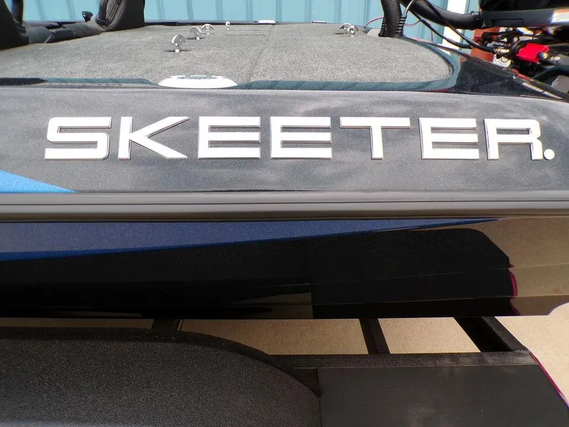 Slide: The Image of 2025 Skeeter ZXR21SE boat with sleek design and branding. - 7