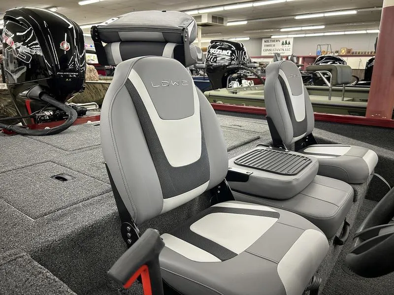 Slide: The Image of 2025 Lowe Stinger 195C boat interior with gray and black seating, featuring modern design. - 5