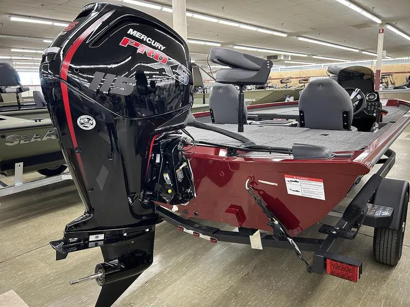 Slide: The Image of 2025 Lowe Stinger 195C boat with Mercury Pro XS engine in showroom. - 8