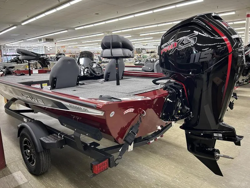 Slide: The Image of 2025 Lowe Stinger 195C boat with Mercury Pro XS 115 engine in showroom. - 9