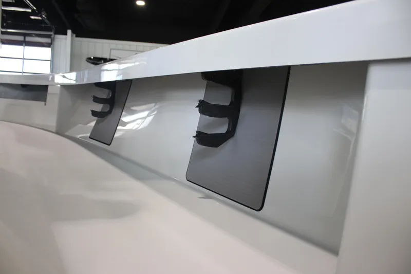 Slide: The Image of 2025 East Cape 25 Open boat interior detail with sleek design and modern features. - 19