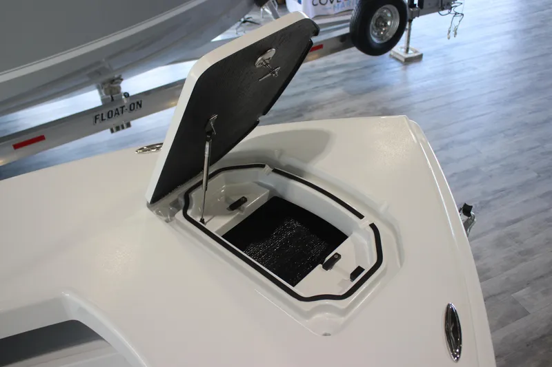 Slide: The Image of 2025 East Cape 25 Open boat with open storage compartment on display. - 21