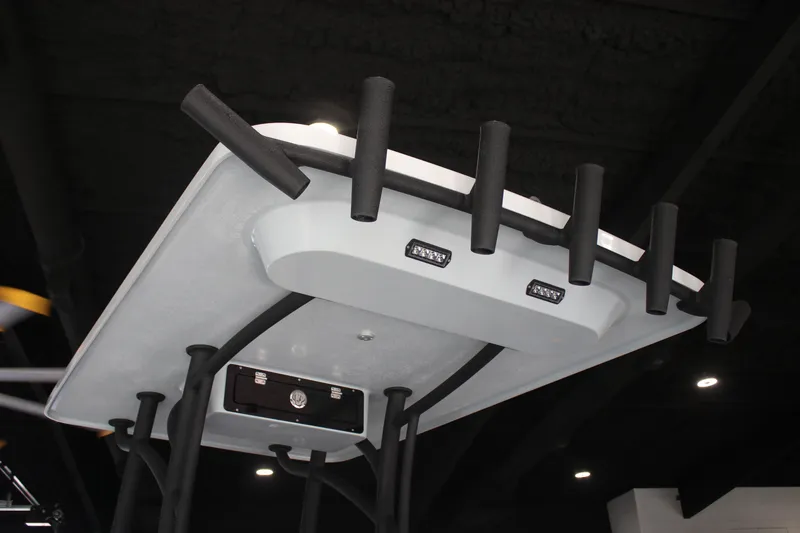 Slide: The Image of 2025 East Cape 25 Open boat with rod holders and LED lights on the T-top. - 23