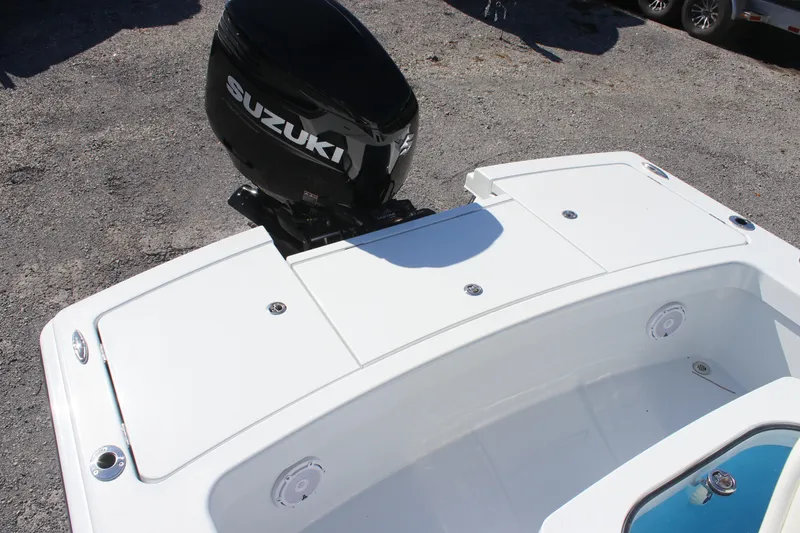 Slide: The Image of 2025 East Cape 25 Open boat with Suzuki outboard motor, rear deck view. - 8