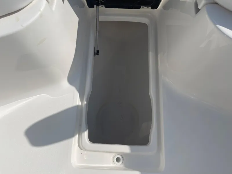 Slide: The Image of Open storage compartment on 2025 Key West 239 FS boat. - 3