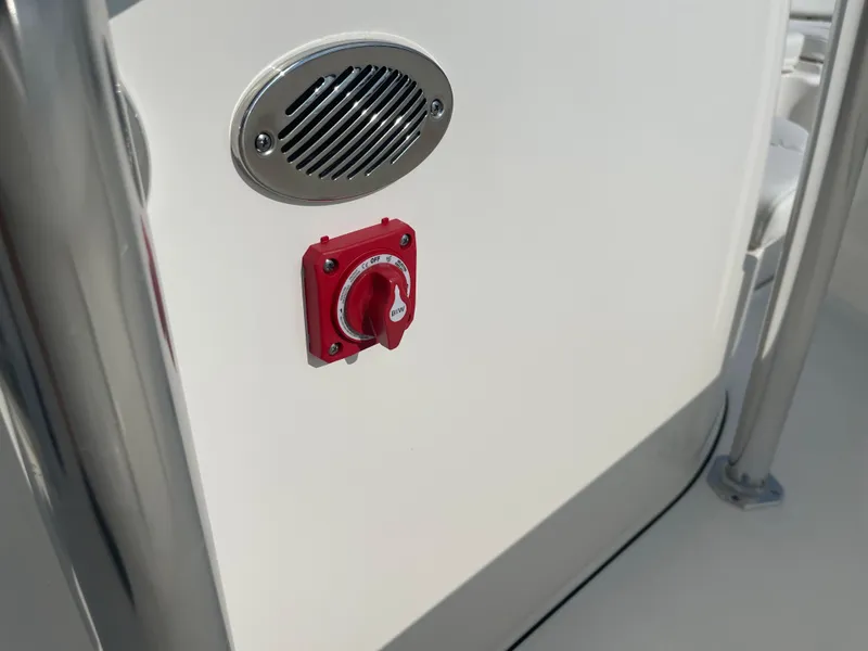Slide: The Image of 2025 Key West 239 FS boat control panel with red switch and speaker. - 4