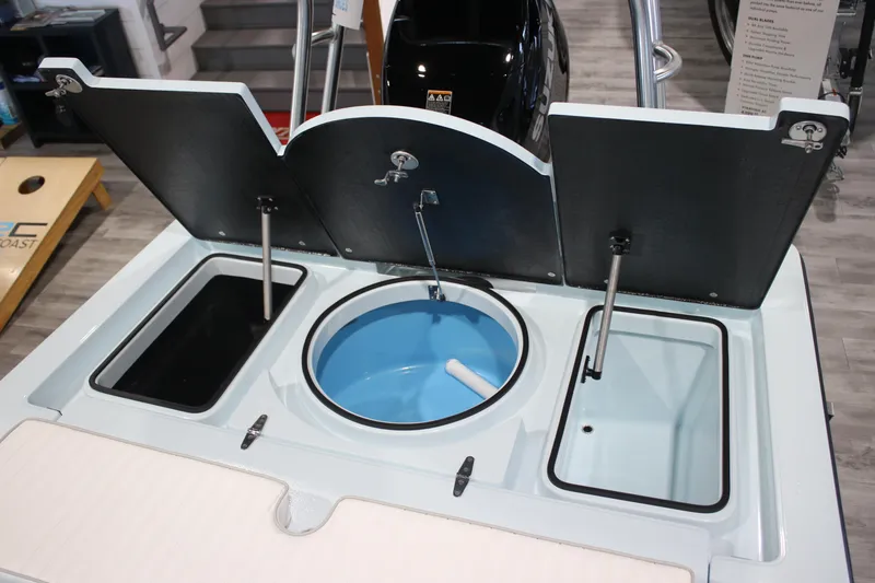 Slide: The Image of 2025 East Cape EVO 18V boat storage compartments and livewell setup. - 10