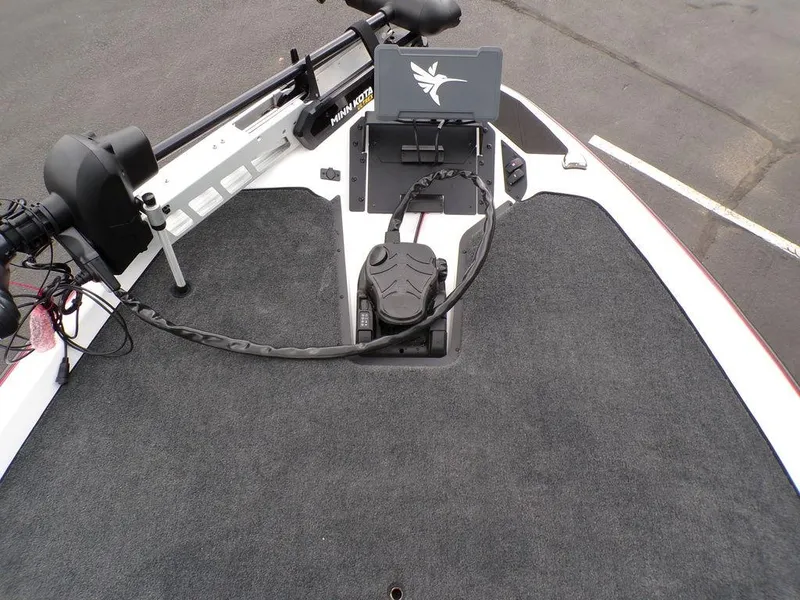 Slide: The Image of 2025 Skeeter ZXR21SE boat deck with trolling motor and control panel. - 10