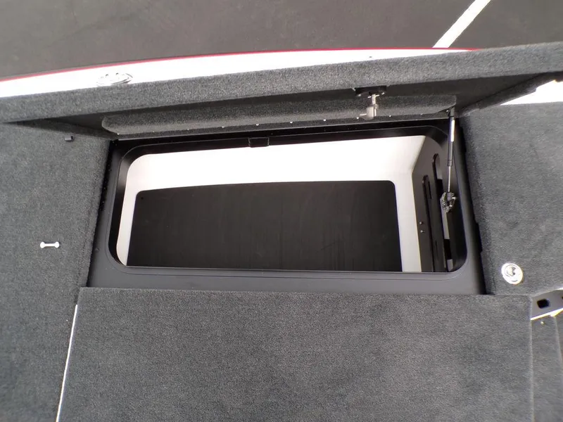 Slide: The Image of Open storage compartment in 2025 Skeeter ZXR21SE boat. - 15