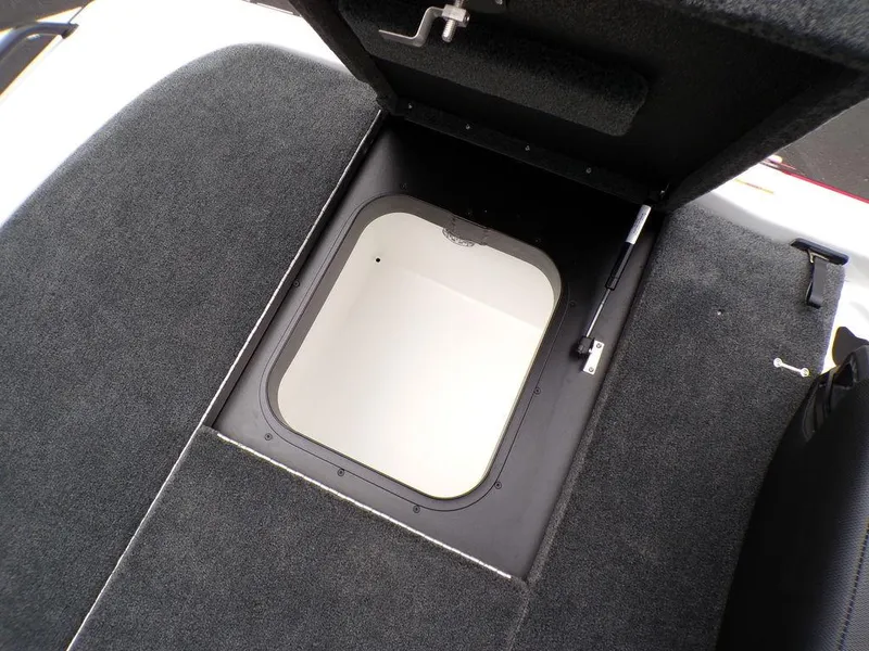 Slide: The Image of 2025 Skeeter ZXR21SE boat storage compartment with open hatch, showcasing interior space. - 23