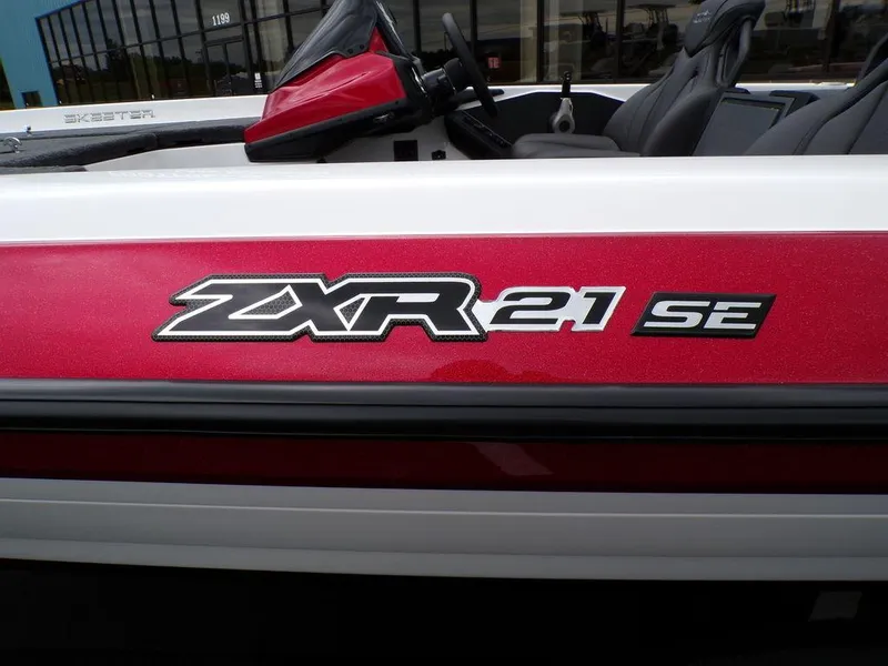 Slide: The Image of 2025 Skeeter ZXR21SE boat with red and white design, featuring model branding. - 4