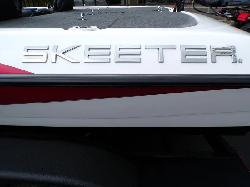 Slide: The Image of 2025 Skeeter ZXR21SE boat with sleek design and bold logo. - 7