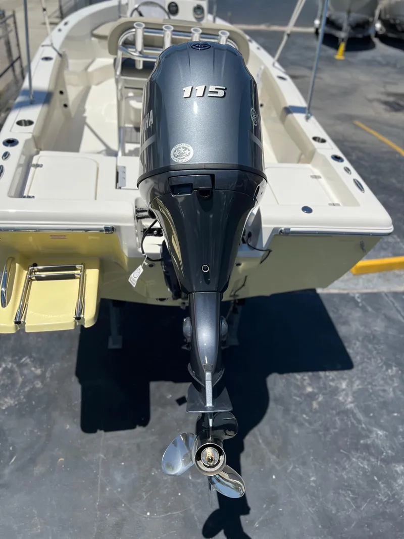 Slide: The Image of 2025 Key West 179 FS boat with Yamaha 115 outboard motor, rear view. - 5