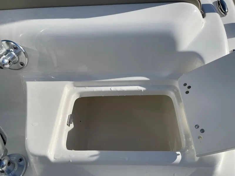 Slide: The Image of Open storage compartment on 2025 Key West 219 FS boat. - 15