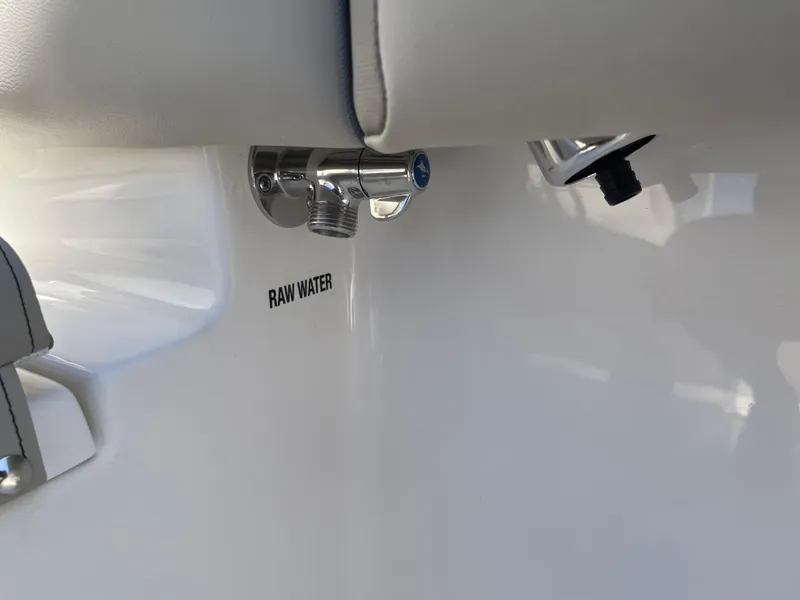 Slide: The Image of 2025 Key West 219 FS boat raw water outlet detail. - 18