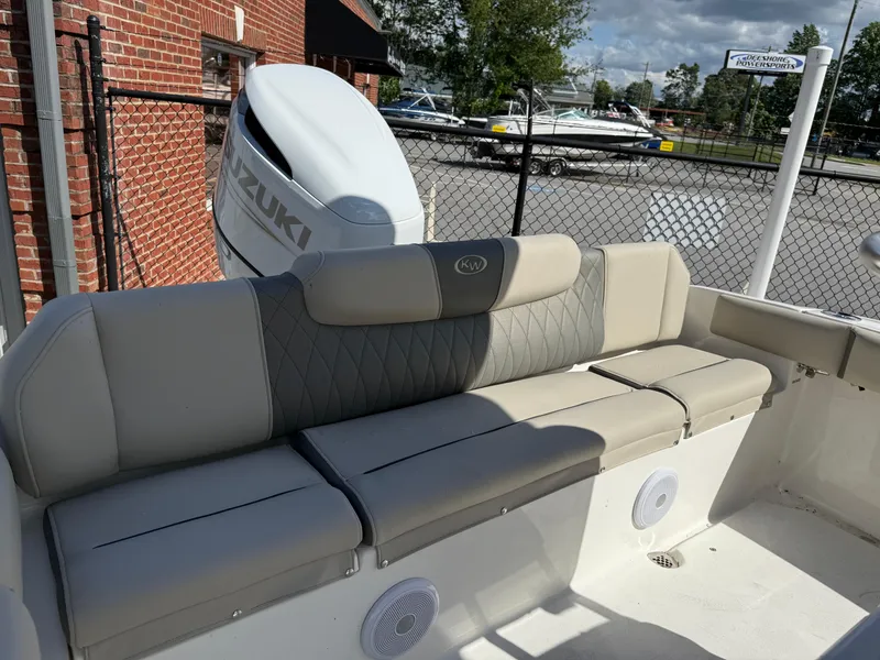 Slide: The Image of 2025 Key West 219 FS boat with Suzuki engine, featuring comfortable seating and modern design. - 9