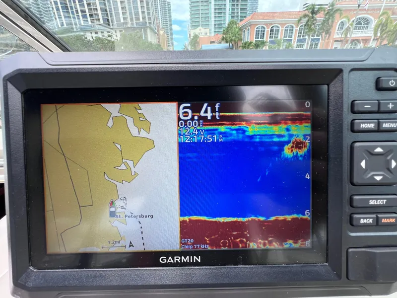 Slide: The Image of Garmin marine GPS display on a 2004 Sea Ray 260 Sundancer, showing depth and navigation map. - 19