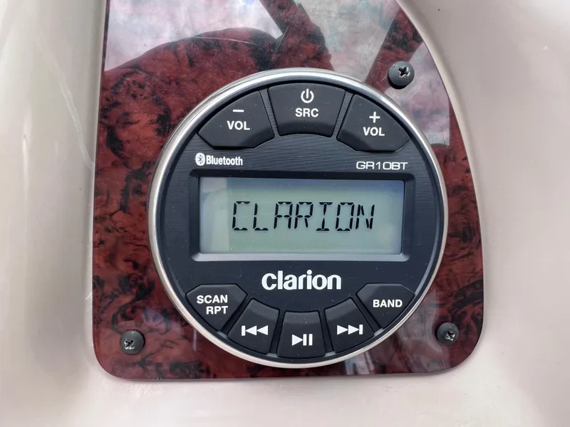 Slide: The Image of Clarion audio system in 2004 Sea Ray 260 Sundancer boat dashboard. - 20