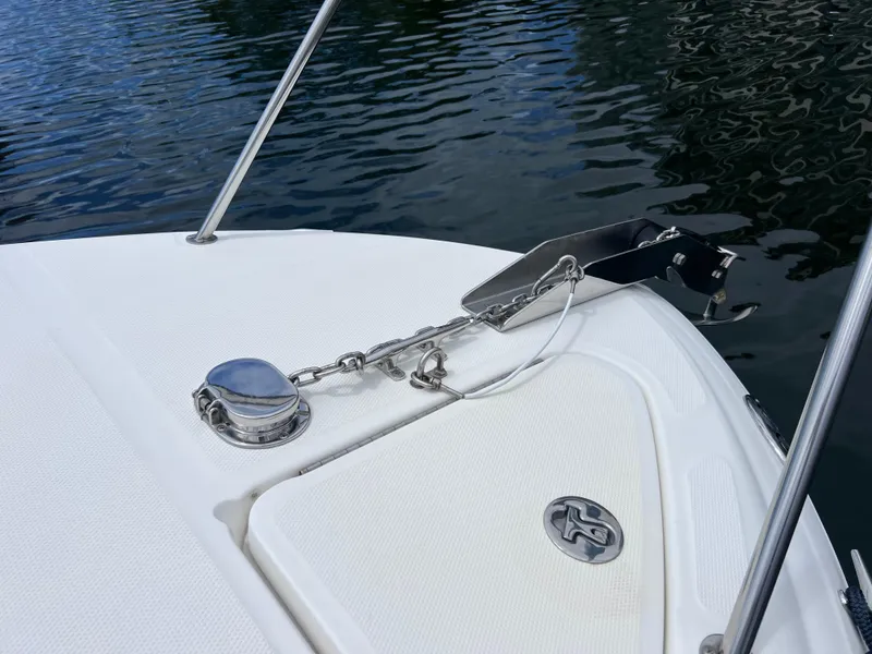 Slide: The Image of Bow of 2004 Sea Ray 260 Sundancer with anchor chain and water reflections. - 8
