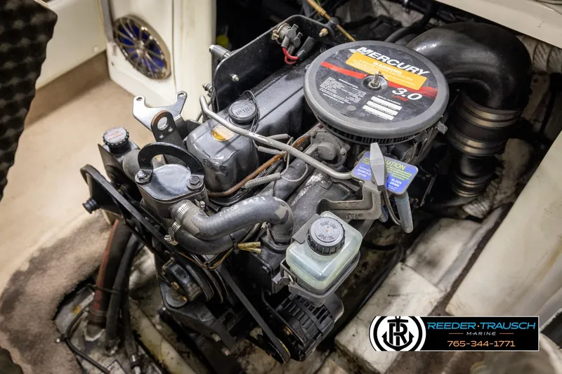 Slide: The Image of Engine of a 2002 Rinker 180 boat with Mercury 3.0 liter motor. - 36