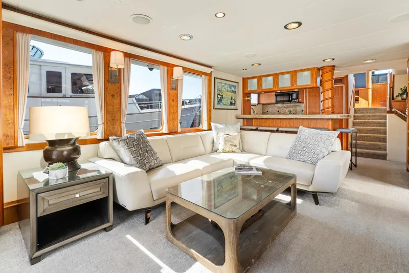 Slide: The Image of Luxurious 1998 Northern Marine Trawler interior with elegant seating, large windows, and modern decor. - 10