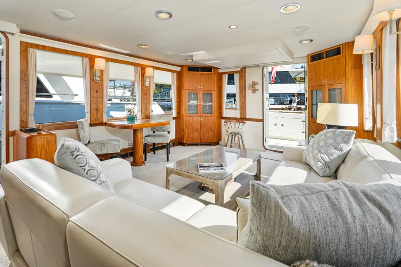 Slide: The Image of Luxurious interior of a 1998 Northern Marine Trawler with elegant furnishings and ample natural light. - 12