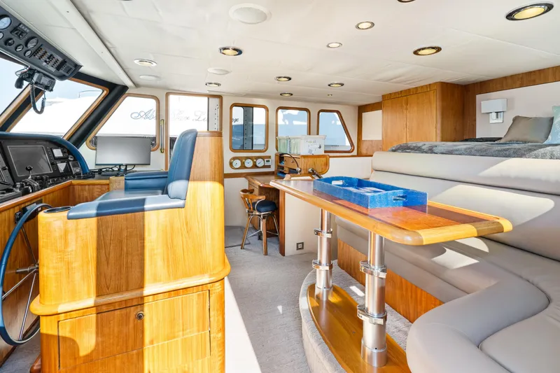Slide: The Image of Luxurious interior of a 1998 Northern Marine Trawler with wood accents and modern amenities. - 25