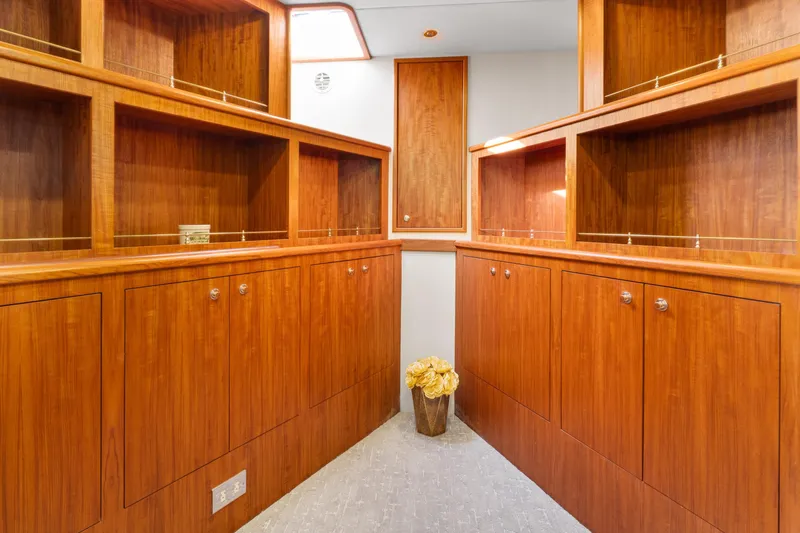 Slide: The Image of Luxurious wooden cabinetry inside a 1998 Northern Marine Trawler yacht. - 30