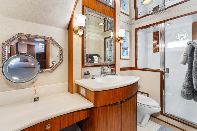 Slide: The Image of Luxurious bathroom in 1998 Northern Marine Trawler with wood accents and modern fixtures. - 32