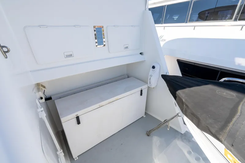 Slide: The Image of 1998 Northern Marine Trawler deck with storage compartment and covered equipment. - 46