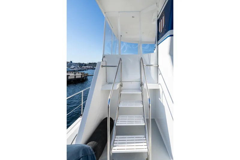 Slide: The Image of Staircase on 1998 Northern Marine Trawler with ocean view in background. - 47