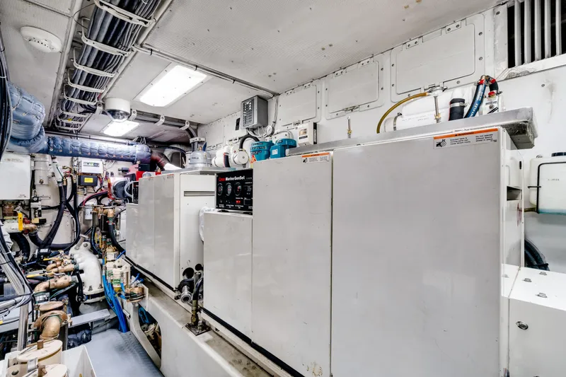 Slide: The Image of Engine room of a 1998 Northern Marine Trawler, showcasing machinery and equipment. - 77