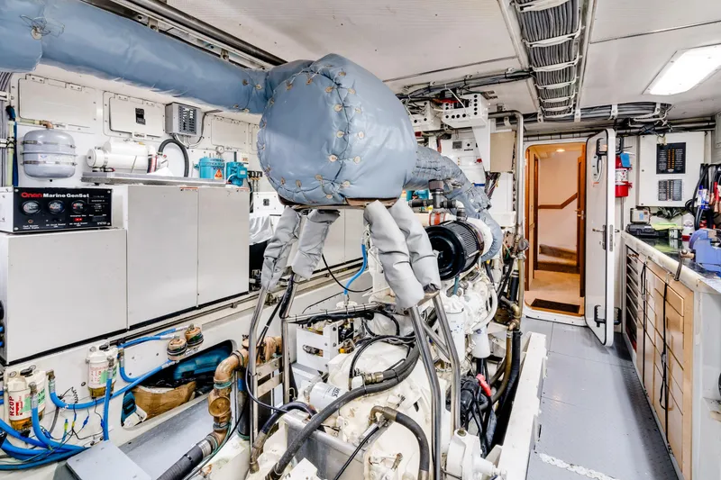 Slide: The Image of Engine room of a 1998 Northern Marine Trawler, showcasing machinery and equipment. - 79