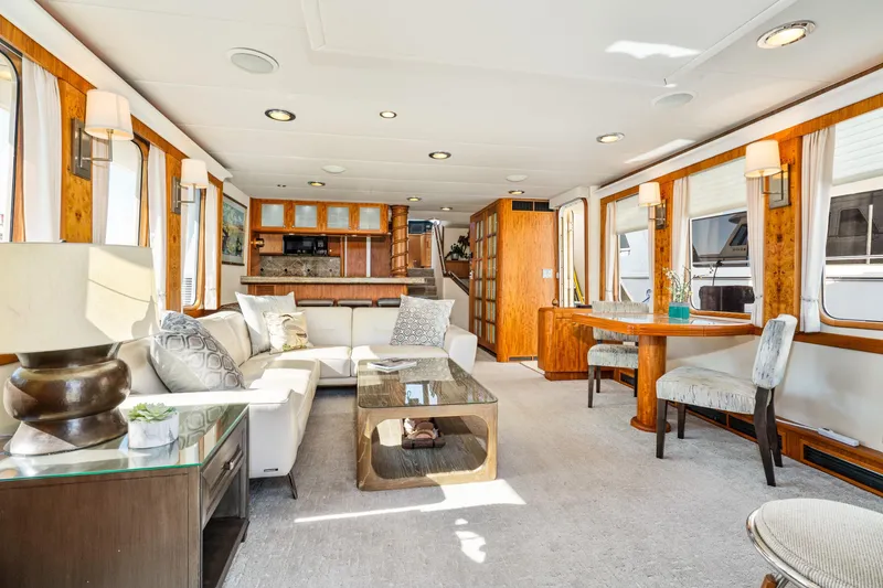 Slide: The Image of Luxurious interior of a 1998 Northern Marine Trawler with elegant furnishings and ample natural light. - 9