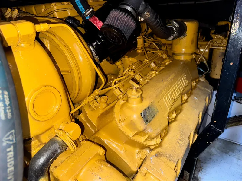 Slide: The Image of Engine of 1997 Viking Sport Cruisers 48SC, showcasing detailed mechanical components. - 23