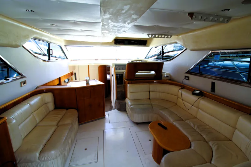 Slide: The Image of Luxurious interior of 1997 Viking Sport Cruisers 48SC yacht with plush seating and modern design. - 6