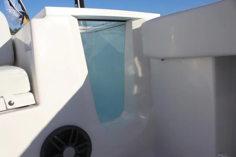 Slide: The Image of 2025 Sea Fox 248 Commander boat interior with speaker and storage compartment. - 10