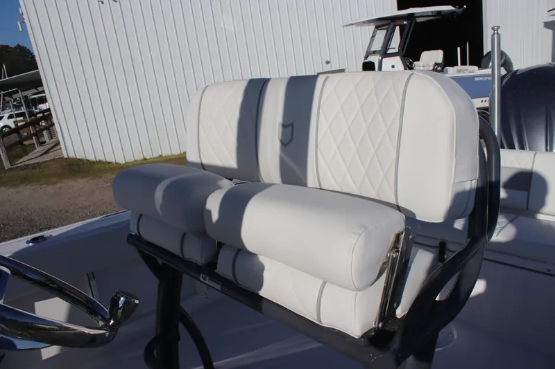 Slide: The Image of 2025 Sea Fox 248 Commander boat seat with white upholstery and diamond stitching. - 14