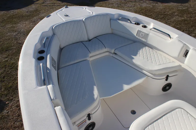 Slide: The Image of 2025 Sea Fox 248 Commander boat with spacious, cushioned seating area. - 15