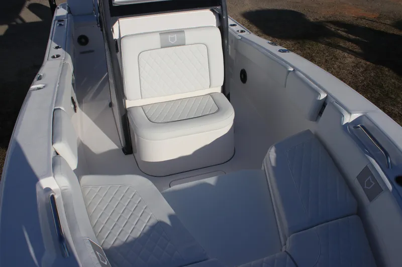 Slide: The Image of 2025 Sea Fox 248 Commander boat interior with cushioned seating and modern design. - 16