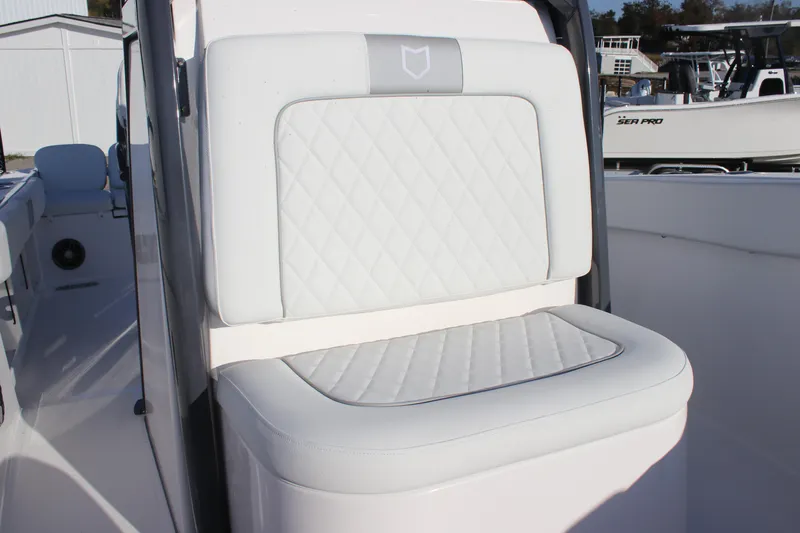 Slide: The Image of 2025 Sea Fox 248 Commander boat seat with quilted white upholstery. - 18