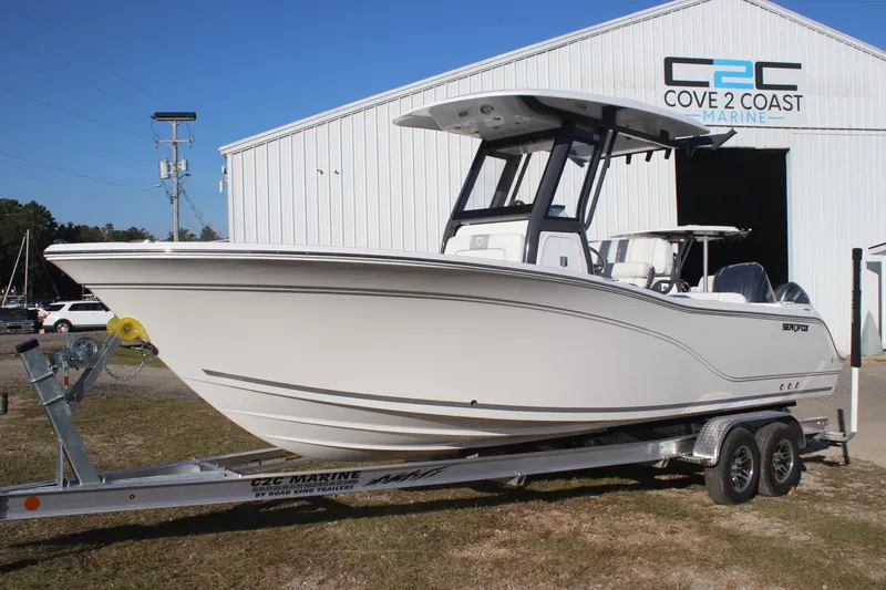 Slide: The Image of 2025 Sea Fox 248 Commander boat on trailer at Cove 2 Coast Marine. - 2