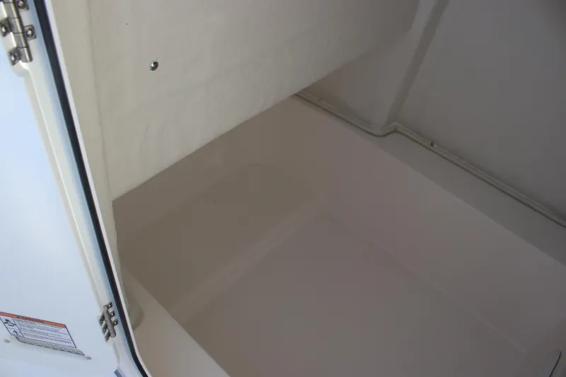 Slide: The Image of Storage compartment of 2025 Sea Fox 248 Commander boat, showcasing spacious interior design. - 22